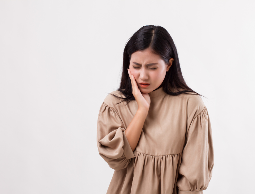 Understanding Tooth Sensitivity: Causes and Solutions